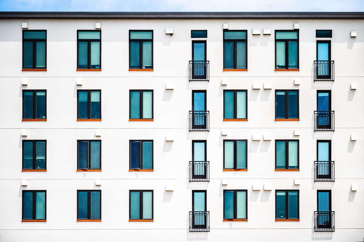modern white apartment exterior suitable for multi-family-countertop-contractor projects